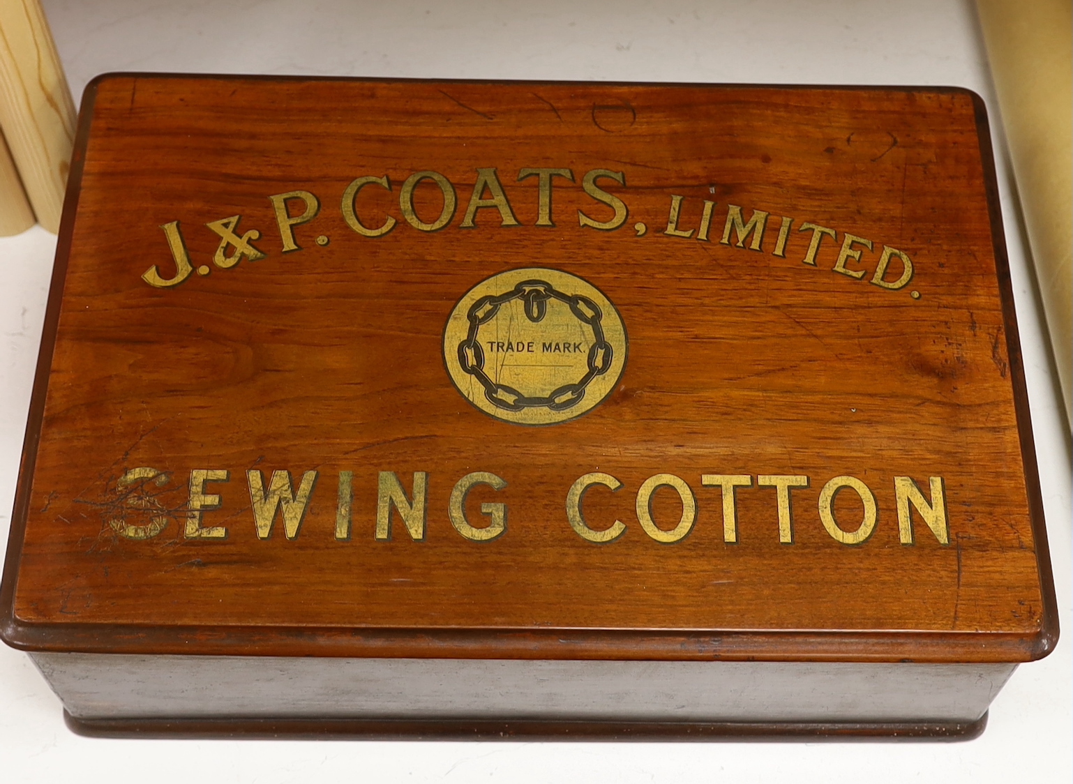 A retailer’s walnut counter box advertising 'J. & P. Coats Limited Sewing Cotton', two drawers with dividers, width 47cm, depth 32cm, height 15cm